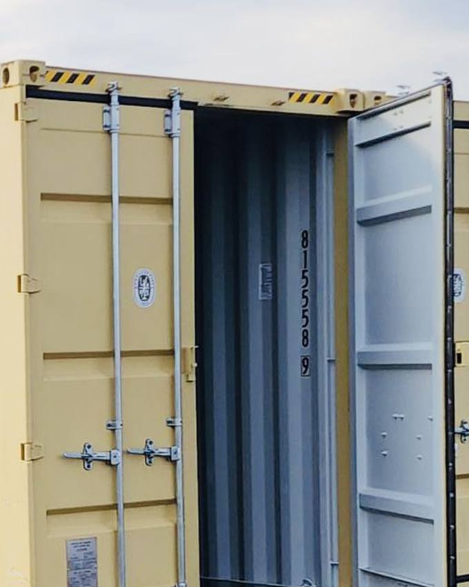 Storage containers lined up in the yard